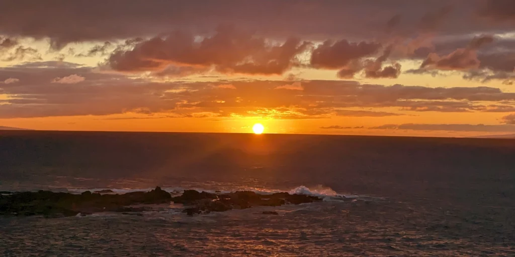 Beautiful sunset view over the ocean and rocks along the Kapalua Coastal Trail