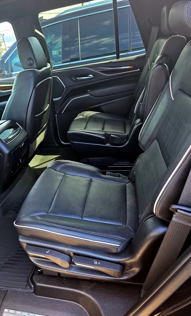 Second-row captain's chairs inside the Maui Luxe Cadillac Escalade.