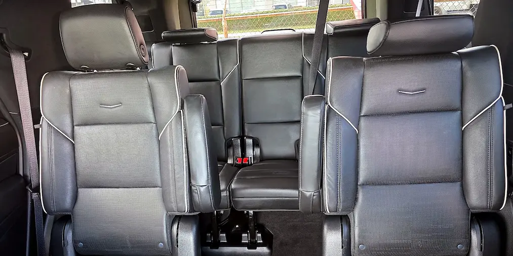 Three-row seating layout inside the Maui Luxe Cadillac Escalade.